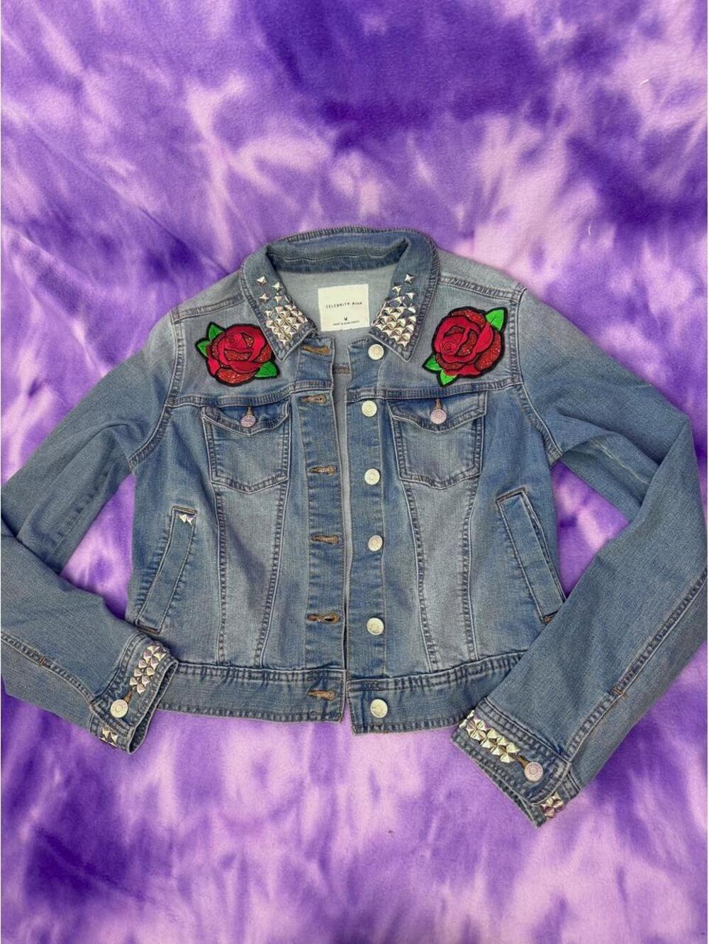 Customized denim jacket with silver studs and roses